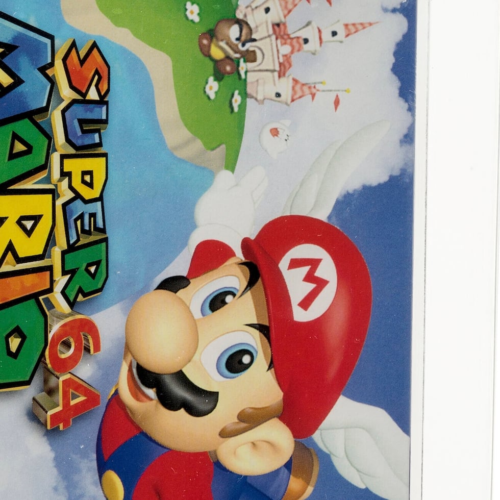 En esta imagen cortesía de Heritage Auctions se muestra una copia sin abrir del juego Super Mario 64 de Nintendo, la cual fue subastada en 1.56 millones de dólares.