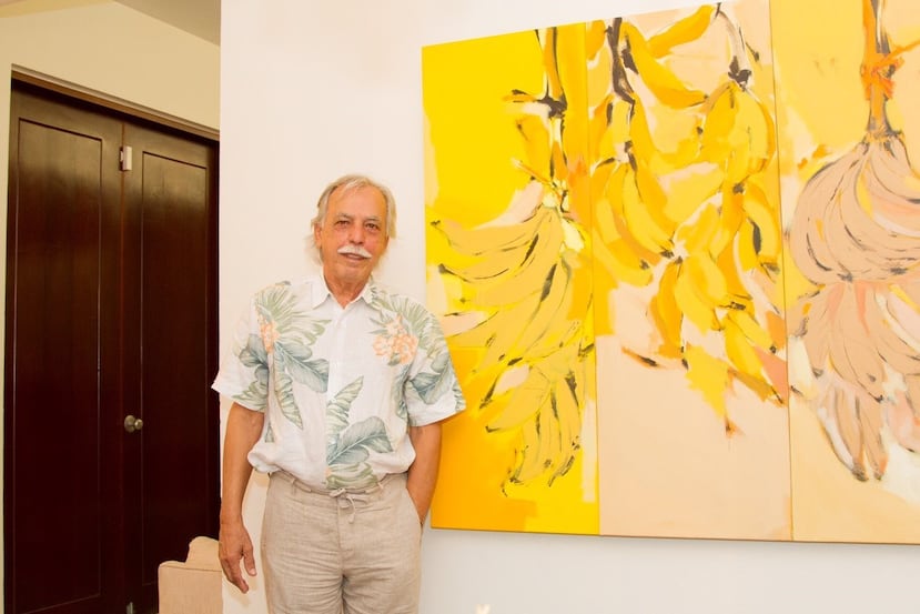Nelson Sambolín, junto a la pintura Amarillo, amarillo, los plátanos. (Suministrada)