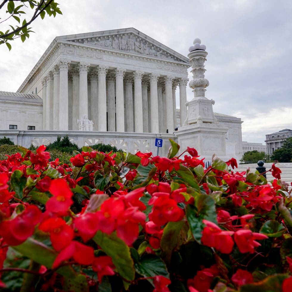 In this Oct. 4, 2021 photo, the Supreme Court is seen on the first day of the new term, in Washington. Abortion already is dominating the Supreme Court’s new term, months before the justices will decide whether to reverse decisions reaching back nearly 50 years. Not only is there Mississippi’s call to overrule Roe v. Wade, but the court also soon will be asked again to weigh in on the Texas law banning abortion at roughly six weeks. (AP Photo/J. Scott Applewhite)