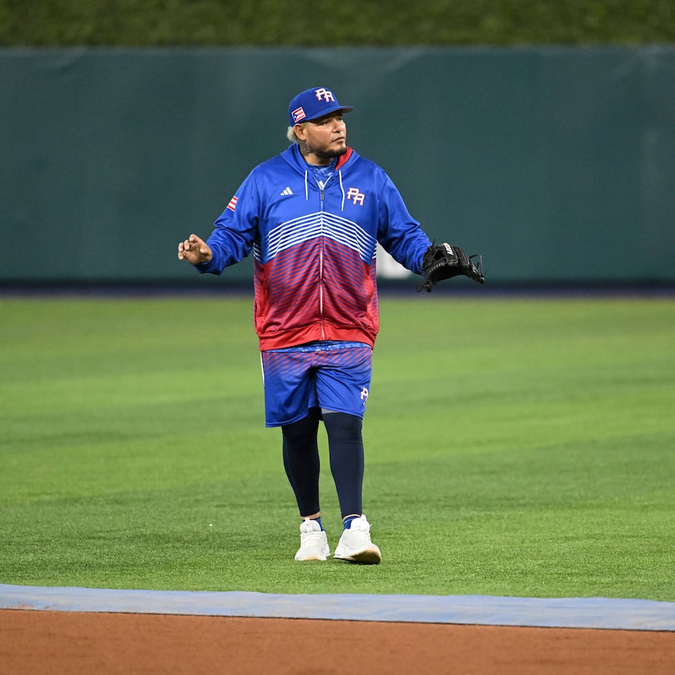 Yadier Molina, dirigente de Puerto Rico, durante la práctica del equipo previo al partido del viernes contra México por el pase a semifinales del Clásico Mundial de Béisbol.