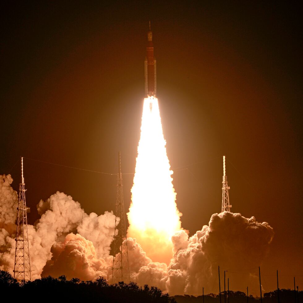 NASA's new moon rocket lifts off from Launch Pad 39B at the Kennedy Space Center in Cape Canaveral, Fla., Wednesday, Nov. 16, 2022. This launch is the first flight test of the Artemis program. (AP Photo/John Raoux)