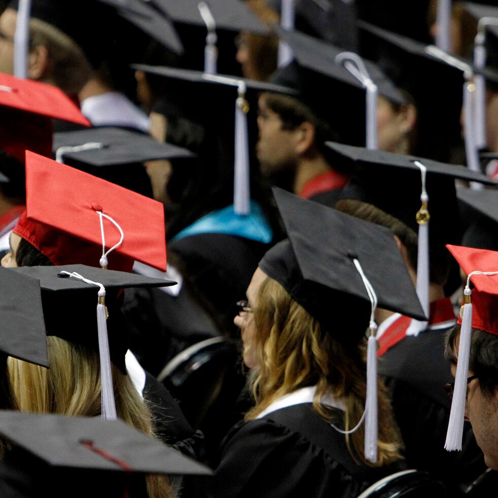 FILE - In this Saturday, Aug. 6, 2011 file picture, students attend graduation ceremonies at the University of Alabama in Tuscaloosa, Ala. The number of borrowers defaulting on federal student loans has jumped sharply, the latest indication that rising college tuition costs, low graduation rates and poor job prospects are getting more and more students over their heads in debt. The national two-year cohort default rate rose to 8.8 percent in 2009, from 7 percent in fiscal 2008, according to figures released Monday, Sept. 12, 2011 by the Department of Education. (AP Photo/Butch Dill)