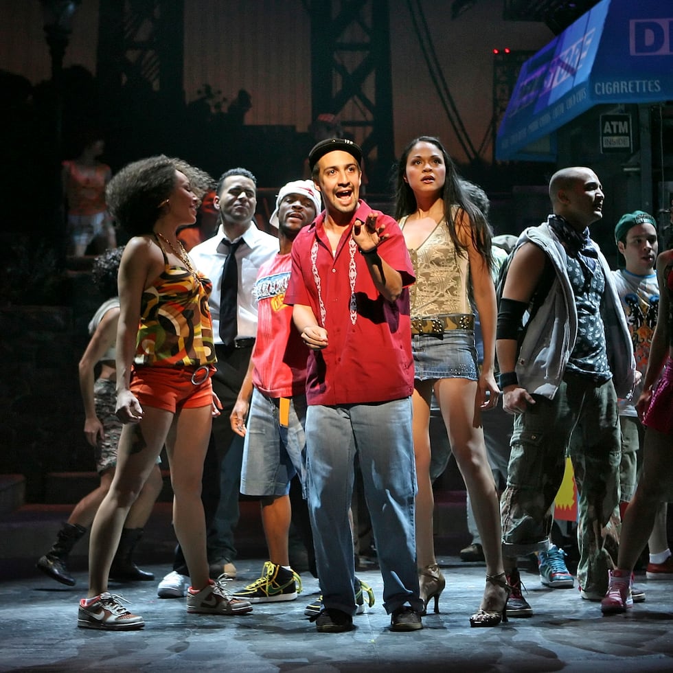 (NYT48) NEW YORK -- May 13, 2008 -- TONY-NOMINEES --Lin-Manuel Miranda, center, as Uanavi in the musical "In the Heights" at the Richard Rodgers Theater in Manhattan, Feb. 13, 2008. "In the Heights," a rap, hip-hop and salsa flavored musical about Latino families in Washington Heights, led the Tony nominations, which were announced on Tuesday morning, May 13, 2008 with 13 nods, including two for Lin-Manuel Miranda, the show's 28-year-old creator and star. (Sara Krulwich/The New York Times)