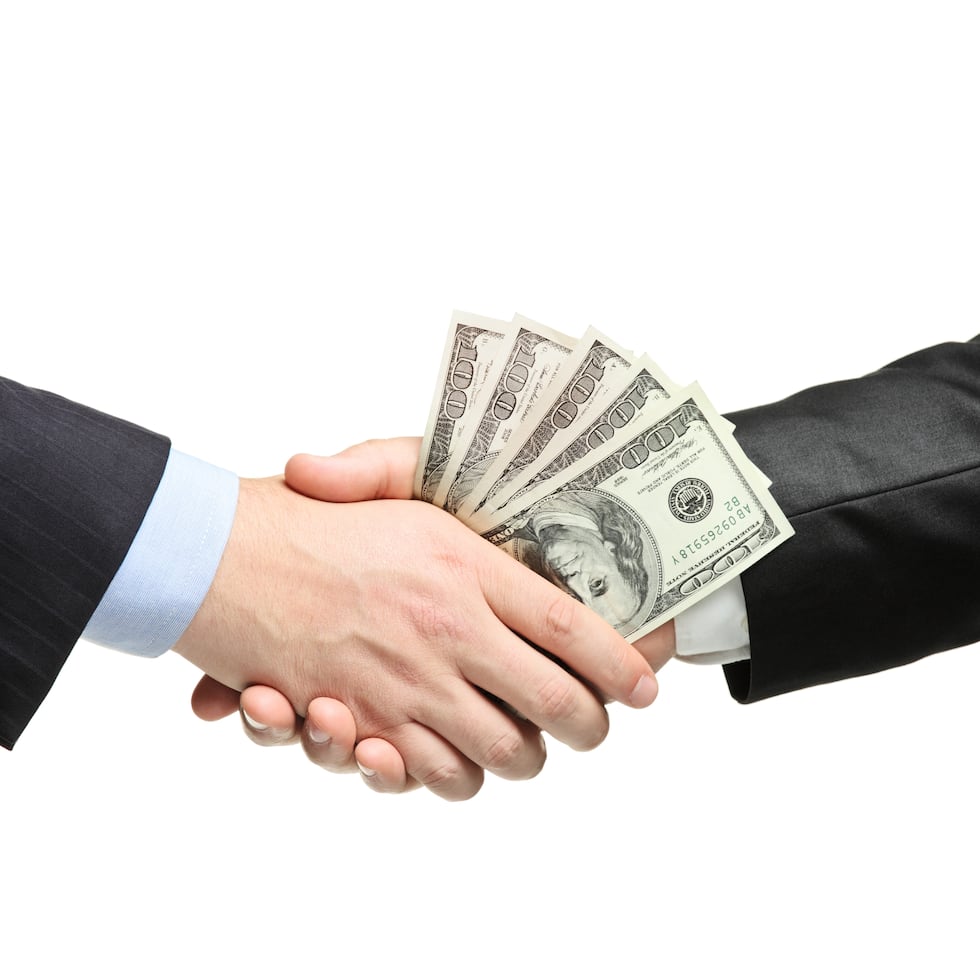 Handshake with money