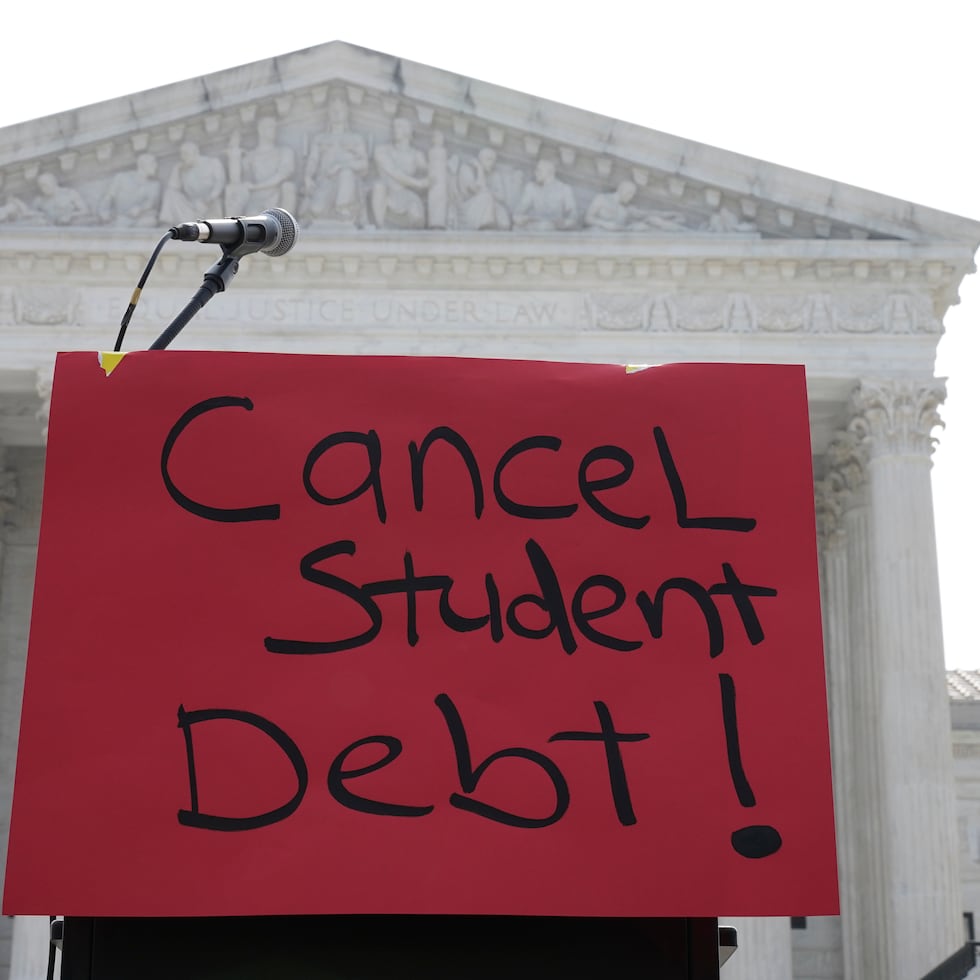 A sign reading "cancel student debt" outside the U.S. Supreme Court during a June 30, 2023 demonstration.