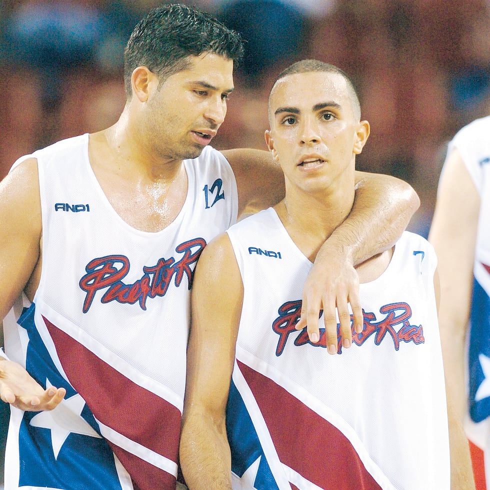 Rolando Hourruitiner and Carlos Arroyo share a match of the Puerto Rico national team.